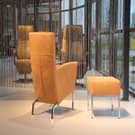 Design fauteuil Living in leer van Ojee Design met Hocker